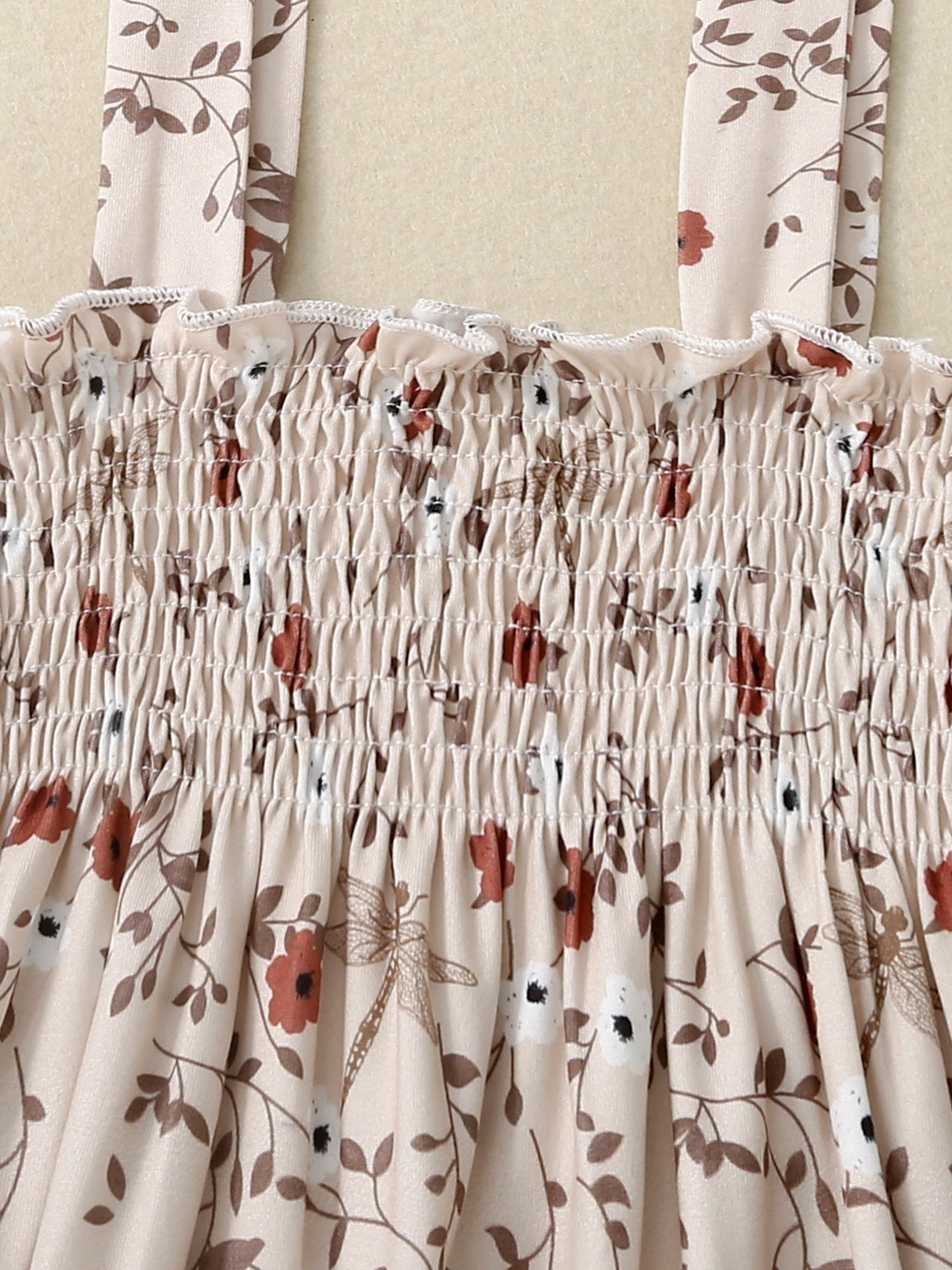girls-floral-smocked-jumpsuit-side-view-lightweight-kids-fashion