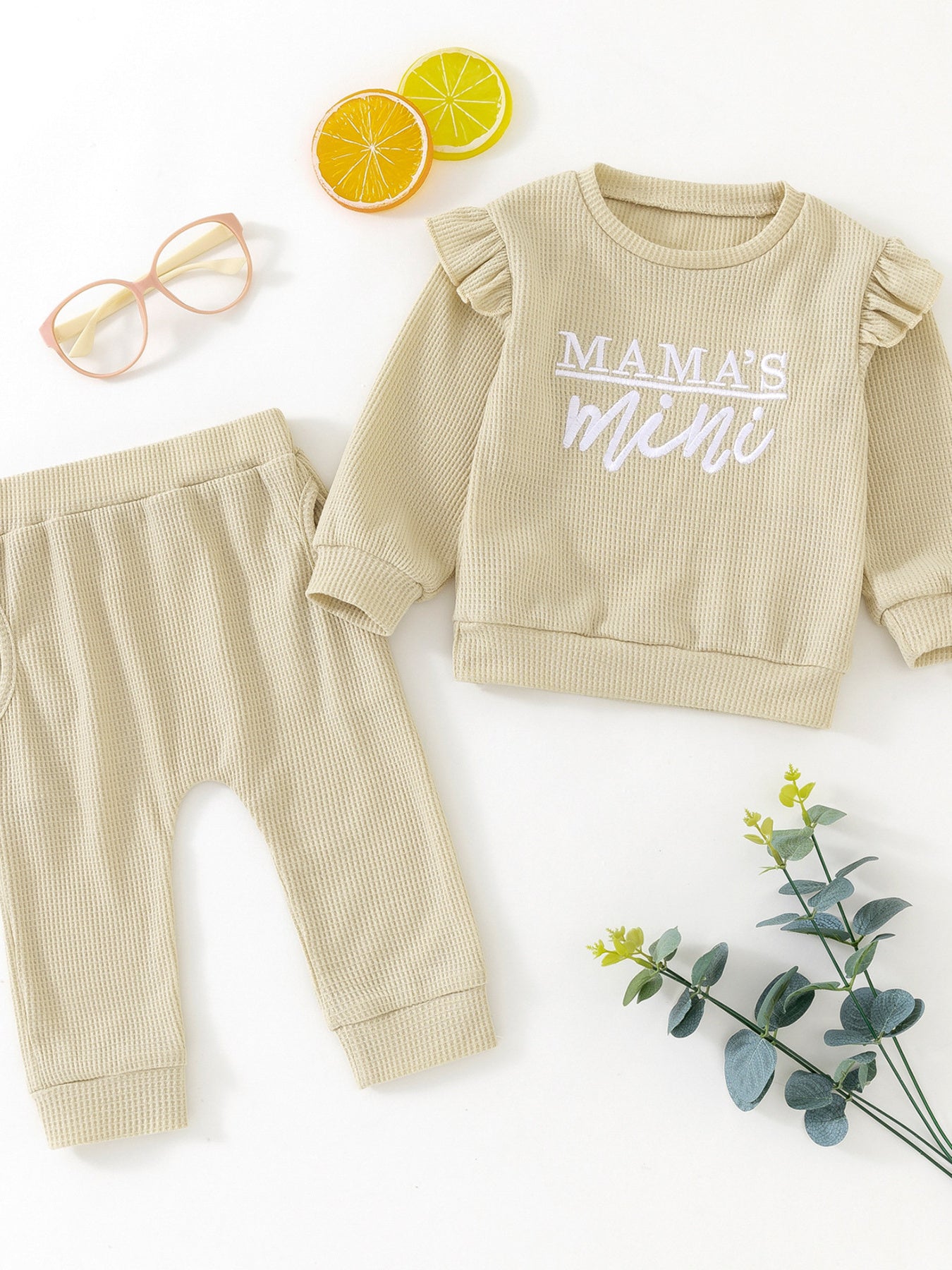 close-up-kids-letter-ruffled-trim-top-detail