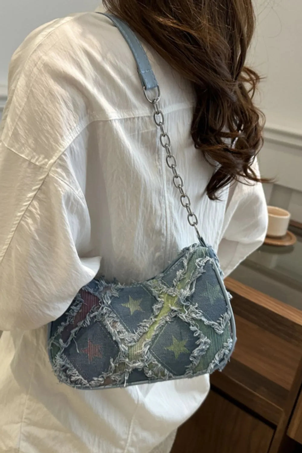 fringe-star-print-shoulder-bag-side-view-trendy-accessory